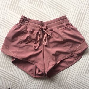 Mauve colored lululemon shorts